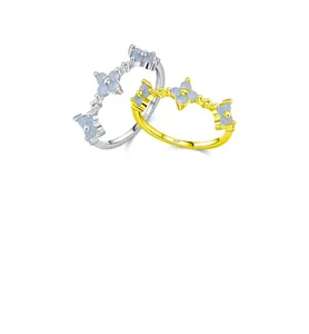 Detail of S925 sterling silver rings with blue opal flowers and S925 hallmark