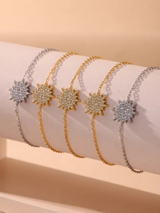 Detailed display of five sun flower bracelets in gold and silver finish with zircons