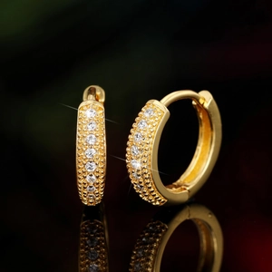 Classic gold hoop earrings for men with pavé-set crystals and beaded metal texture