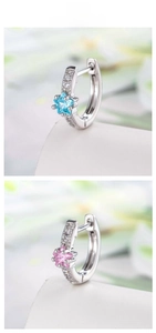Detail of star-cut blue and pink zircon earrings with micro-pave setting in S925 silver