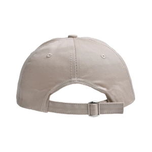 Detail of adjustable metal buckle and fabric strap on beige cotton kids baseball cap