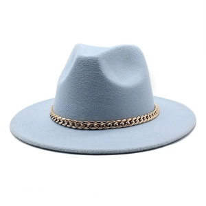 Close-up of light blue wool fedora hat featuring a chunky gold metal curb chain detail