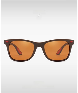 Close-up of classic tea frames with orange polarized lenses and red detail accents