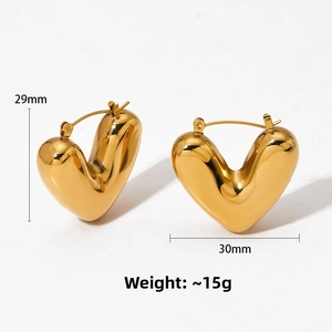 Detail view of 29mm x 30mm gold plated stainless steel heart earrings with dimensions