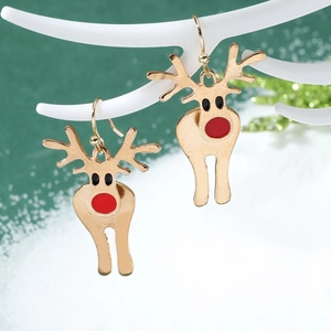 Detail of Christmas reindeer earrings with red nose on a festive decorative stand