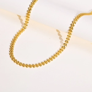 Elegant gold wheat chain necklace in polished stainless steel for a vintage layered look