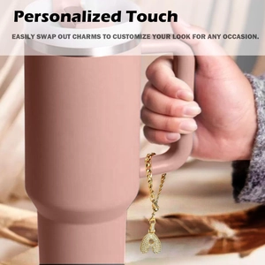 Personalized gold zircon letter B charm with cuban chain on pink tumbler handle