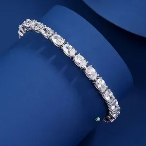 Detail macro view of S925 sterling silver tennis bracelet with oval cut moissanite stones
