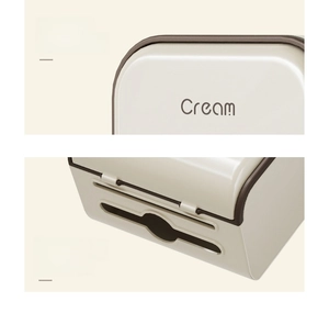Detail of cream tissue box featuring smooth rounded edges and dual-port paper outlets