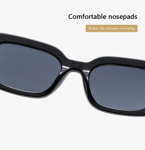 Detail of integrated comfortable nose pads on black square frame sunglasses
