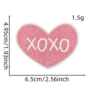Detailed view of pink heart XOXO embroidery patch with size dimensions in cm and inches