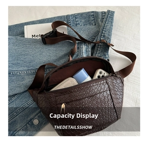 Macro view of woven PU leather chest bag showing interior space for mobile and makeup