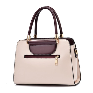 Modern two-tone tote bag in cream and burgundy faux leather with gold-tone hardware