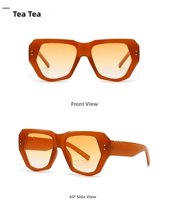 Detail view of tortoiseshell geometric sunglasses with metallic V decoration on the temples