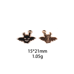 Front and back detail of 15x21mm bat alloy charm with black oil drip for DIY jewelry