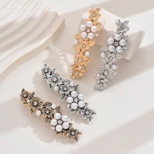 Vintage metal rose hair clips with pearls and rhinestones in gold and silver colors