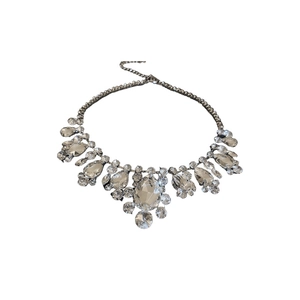 Silver teardrop geometric rhinestone necklace with adjustable chain on white background