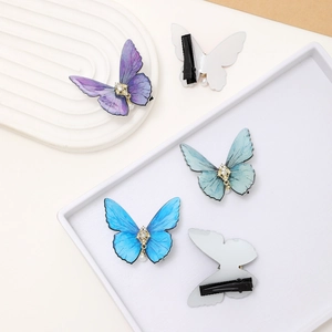 Exquisite butterfly hair clips with crystal and pearl charms in multiple elegant colors