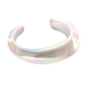 Iridescent acrylic C-shape cuff bracelet with geometric chunky design on white background