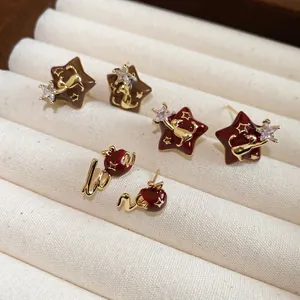 Vintage star and apple earrings with 18k gold plating and colorful enamel detail