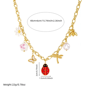 Gold chain necklace with enamel insect and flower charms including bee and ladybug