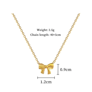 Detailed size map of the gold bow necklace showing 45cm chain length and pendant dimensions