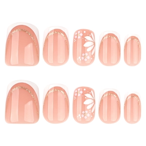 Short square press-on nails with white French tips and delicate floral patterns