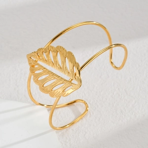 Minimalist gold leaf open cuff bracelet in stainless steel with brushed metal finish