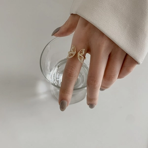 Elegant gold butterfly open ring for women with cubic zirconia on model's hand