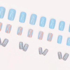 Light blue summer wave press-on nails with glitter sequins in a 24-piece stylish set