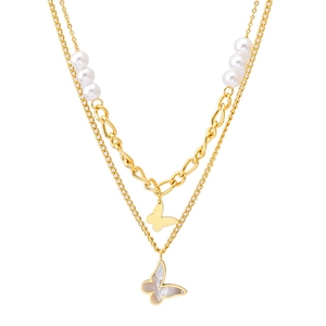 Double-layered gold necklace featuring white pearls and a shell butterfly pendant
