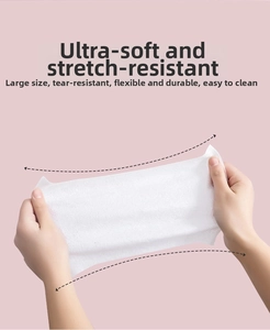 Strong and durable baby wet wipes being stretched to show high elasticity and soft texture