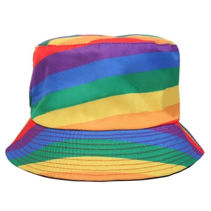 Detailed fabric texture and stitching of a rainbow striped reversible bucket hat for adults