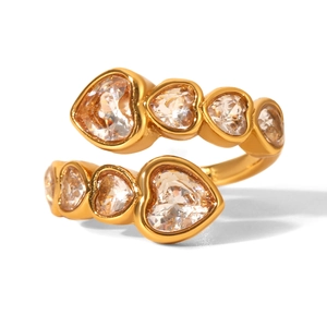 Detail of 18k gold plated wrap ring featuring two rows of heart shaped zircons