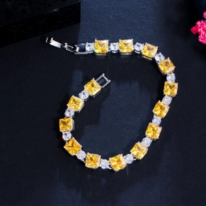 Detailed macro view of S925 hallmark on gold plated brass square yellow zircon bracelet
