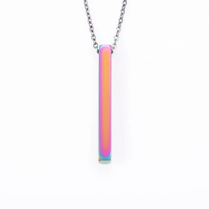 Detailed macro view of a 3D rectangular pendant necklace in a vibrant rainbow metal finish