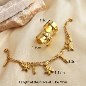 Gold stainless steel starfish and feather jewelry set with bracelet and open rings