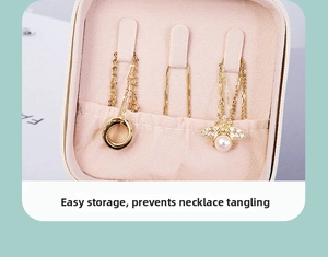 Pink PU leather travel jewelry case featuring three necklace hooks and elastic pocket