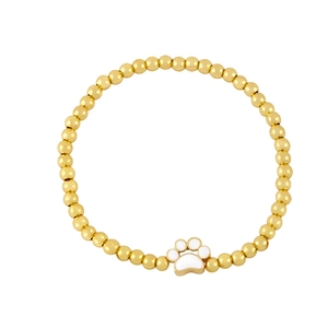 Golden beaded elastic bracelet featuring a white pet paw print pendant on a clean background