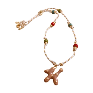 Handcrafted woven cotton rope necklace with ceramic puppy pendant and metallic beads