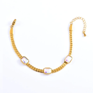 Golden snake chain bracelet featuring colorful square stones and adjustable lobster clasp