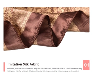 Close-up of paisley satin scarf showing smooth silk texture and fine stitching detail