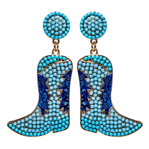 Detail of gold cowboy boot earrings featuring blue beadwork and crystal rhinestone trim