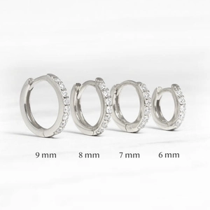 Silver hoop earrings with white zircon in four sizes: 6mm, 7mm, 8mm, and 9mm diameters