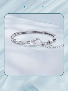 Detail view of S925 sterling silver snake chain bracelet with secure lobster clasp and extender