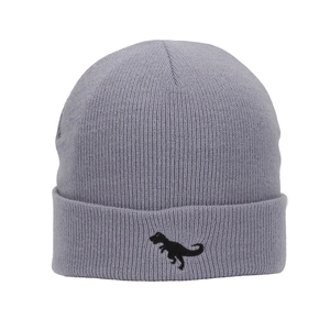 Close-up of grey knitted beanie featuring a black dinosaur embroidery on the wide cuff