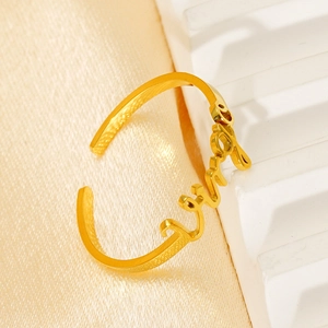 Adjustable gold zodiac titanium steel ring with Arabic calligraphy on satin fabric