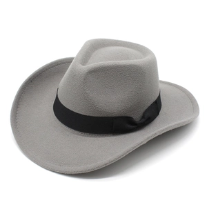 Close-up of gray wool felt cowboy hat featuring a black satin ribbon and fine texture