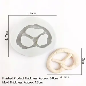 Macro detail of silicone pretzel mold with 5.5x4.7cm dimensions for DIY cake decor