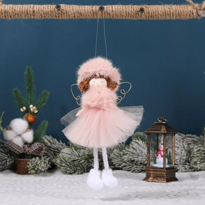 Pink Christmas angel doll with fuzzy dress and gold wings hanging by a pine tree decoration